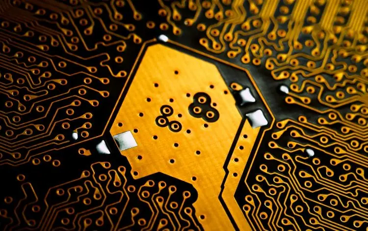 Close-up view of a detailed circuit board with intricate pathways and components