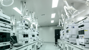 Interior of a modern analytical laboratory with advanced equipment and workstations.