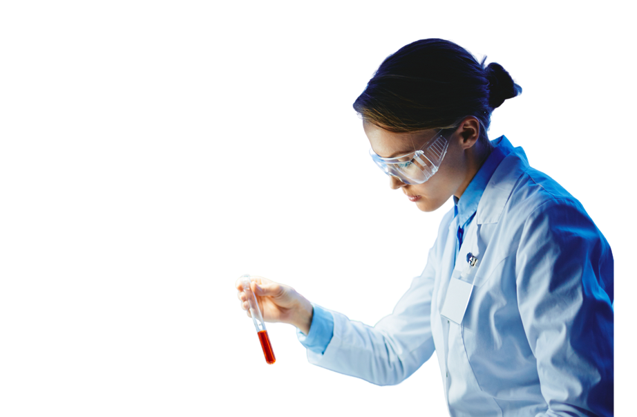 A scientist in safety goggles conducts an experiment, representing ZONTAL's work in synthetic chemistry